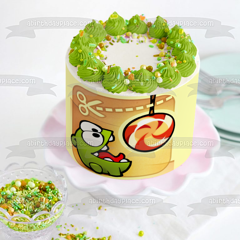 Corta la cuerda Om Nom y una piruleta como adorno comestible para pastel Imagen ABPID06341