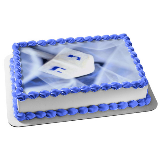 Hanukkah White Dreidel Blue Letters Nes Gadol Haya Sham Edible Cake Topper Image ABPID04847