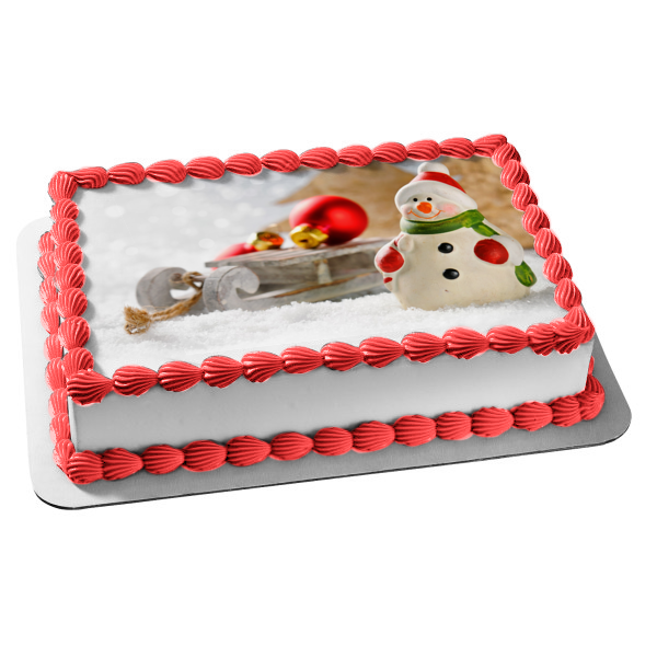 Christmas Snow Man Sled Ball Ornament Edible Cake Topper Image ABPID50630