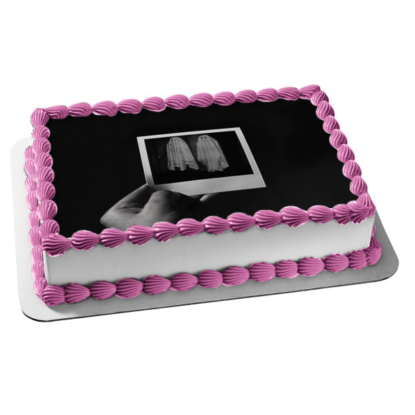 Hand Holding Picture of Ghost Sheets Black and White Edible Cake Topper Image ABPID50860