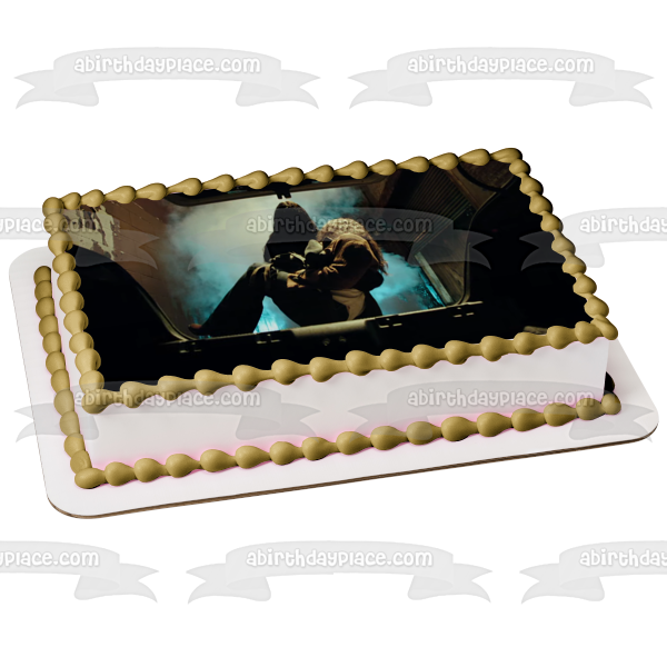 Malignant Madison Mitchell Being Put In a Car Trunk Edible Cake Topper Image ABPID54746