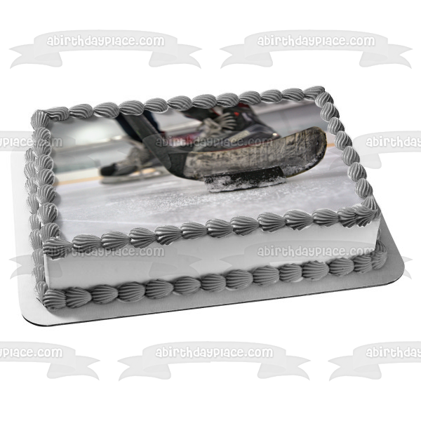 Hockey Stick and Puck on Ice Edible Cake Topper Image ABPID55496