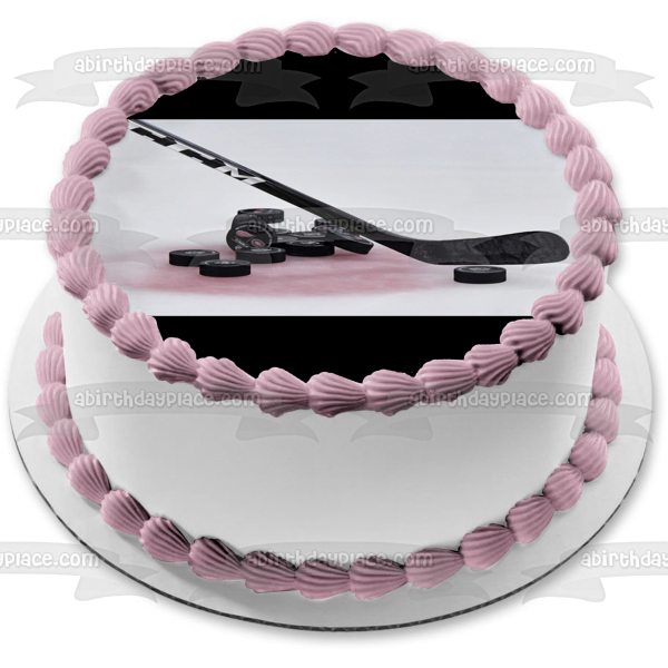 Hockey Stick and Pucks on Ice Rink Edible Cake Topper Image ABPID55828