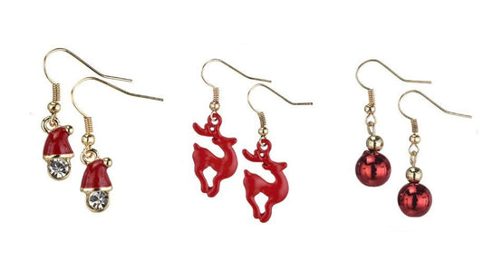 Pendientes surtidos de renos, gorros de Papá Noel y bolas doradas